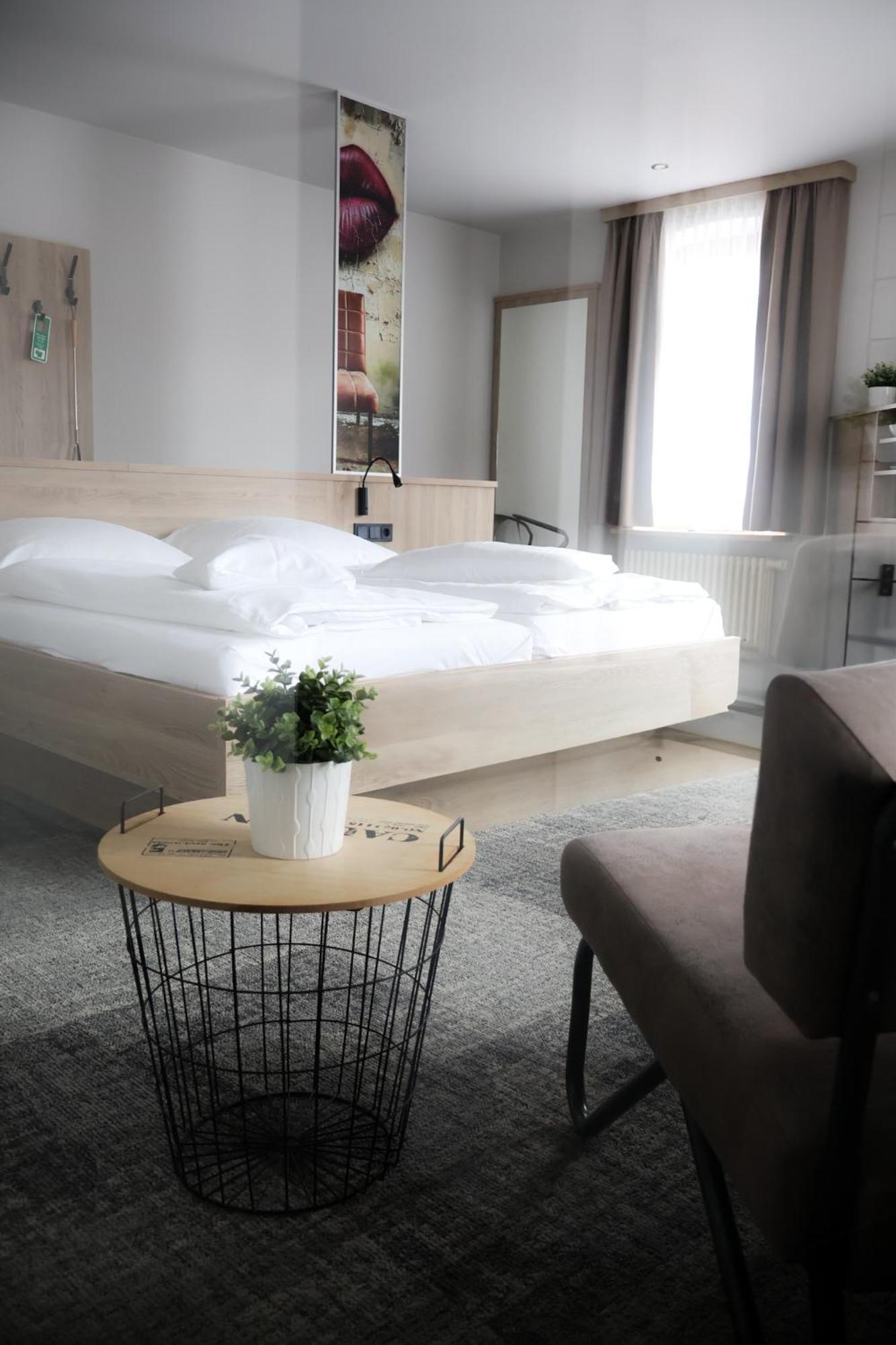 Alexxanders Hotel & Boardinghouse, Restaurant Chemnitz Szoba fotó